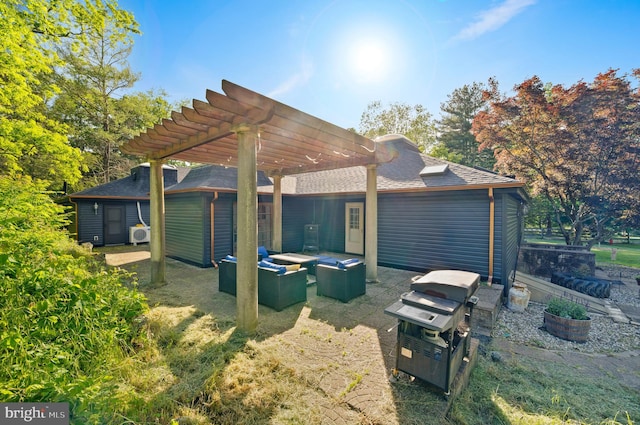 2436 Warm Springs Rd, Shenandoah Junction, WV 25442 - view of home's exterior with a pergola, an outdoor living space, roof with shingles, and a patio area