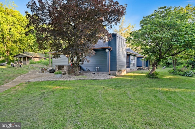 2436 Warm Springs Rd, Shenandoah Junction, WV 25442 - view of home's exterior featuring a yard and a chimney