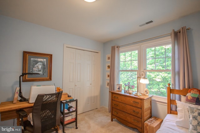 office area with light colored carpet and visible vents