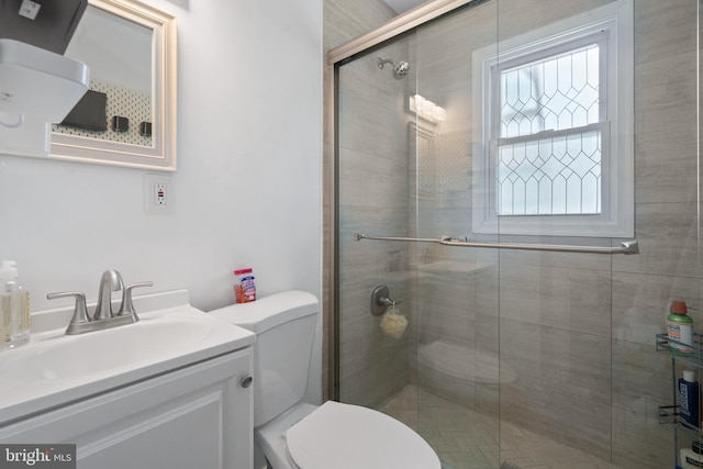 13432 Forest Glen Rd, Woodbridge, VA 22191 - bathroom featuring vanity, a stall shower, and toilet