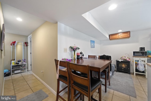 13432 Forest Glen Rd, Woodbridge, VA 22191 - dining room featuring light tile patterned floors, baseboards, and recessed lighting