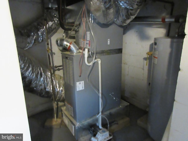 utilities featuring water heater and heating unit