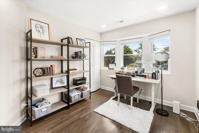 office featuring recessed lighting, baseboards, visible vents, and dark wood-type flooring