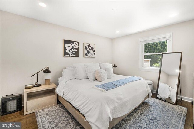 bedroom featuring recessed lighting, baseboards, and dark wood-style floors
