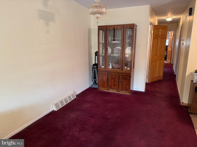 9881 Clark St, Philadelphia, PA 19115 - interior space with visible vents, baseboards, dark carpet, and a notable chandelier