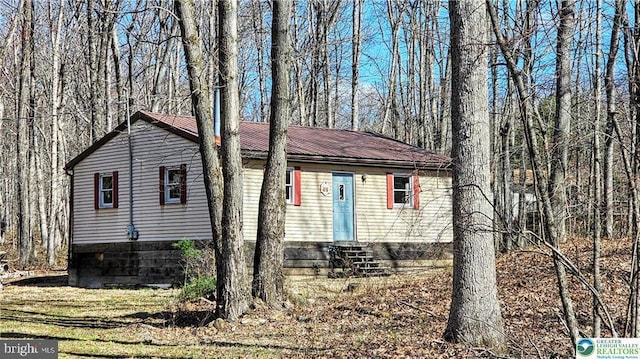 view of property exterior with entry steps
