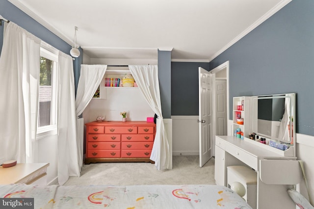 bedroom featuring crown molding and carpet floors