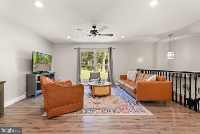 living room featuring recessed lighting, wood finished floors, and ceiling fan