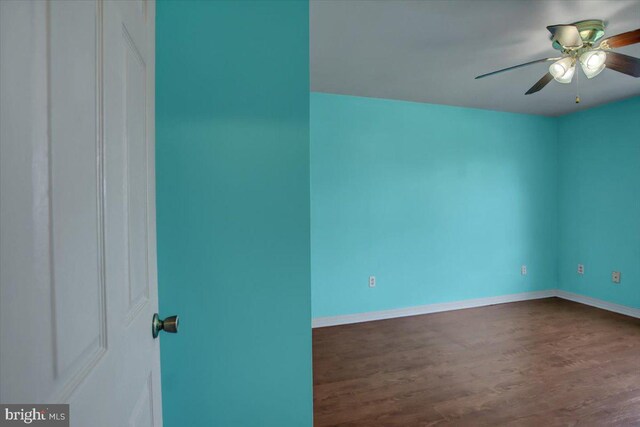 2284 Pine Rd, Newville, PA 17241 - unfurnished room featuring baseboards, a ceiling fan, and dark wood-style floors