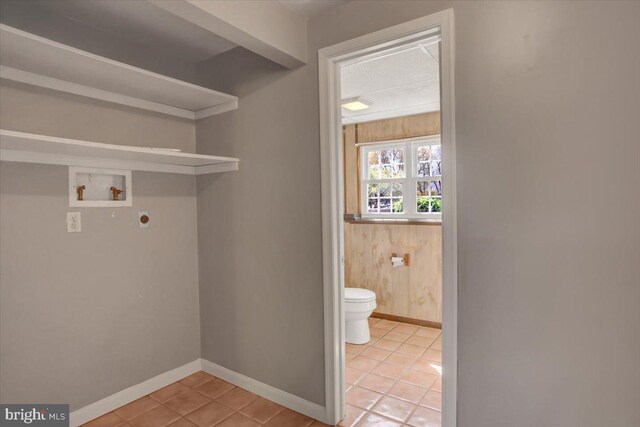 2284 Pine Rd, Newville, PA 17241 - laundry area with light tile patterned flooring, baseboards, hookup for a washing machine, electric dryer hookup, and laundry area