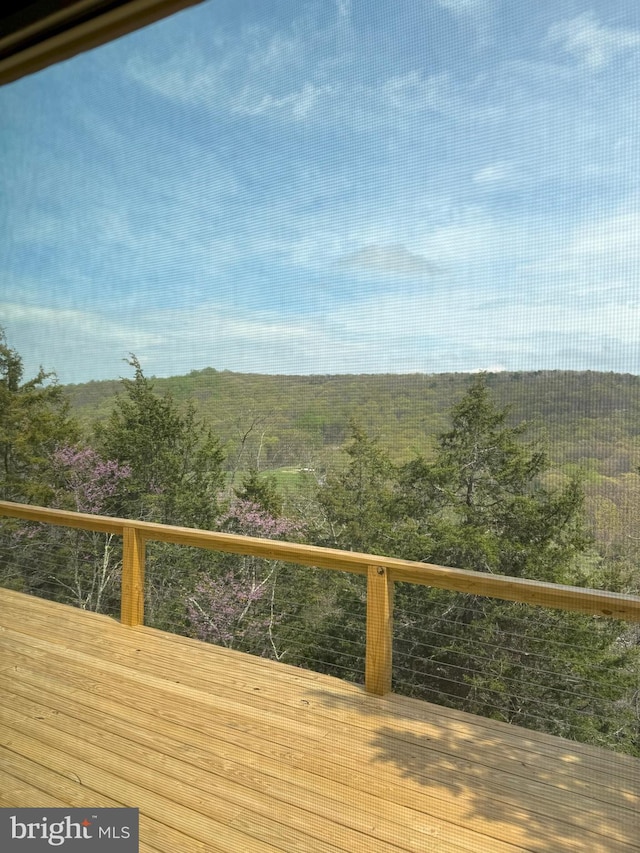 deck with a forest view