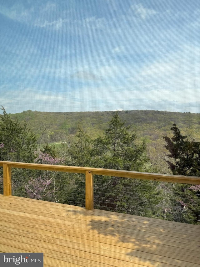 deck with a view of trees