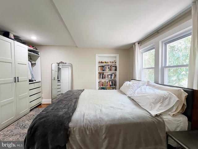 bedroom with wood finished floors