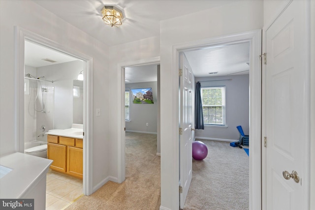 6780 Hollow Glen Ct, Gainesville, VA 20155 - corridor featuring light colored carpet and baseboards