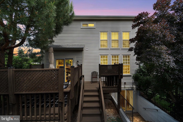 6780 Hollow Glen Ct, Gainesville, VA 20155 - rear view of house with stairway and a deck