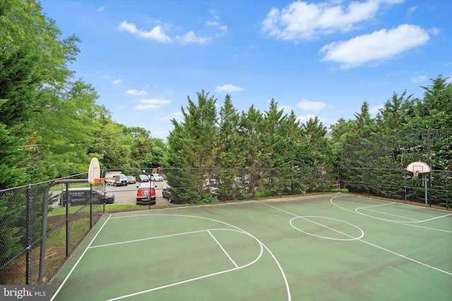6780 Hollow Glen Ct, Gainesville, VA 20155 - view of basketball court featuring community basketball court and a wooded view