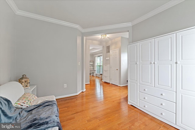 6780 Hollow Glen Ct, Gainesville, VA 20155 - sitting room with crown molding, light wood finished floors, and baseboards