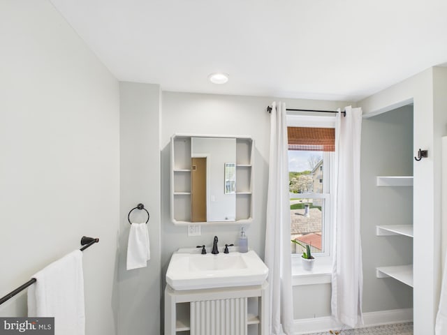 bathroom featuring baseboards