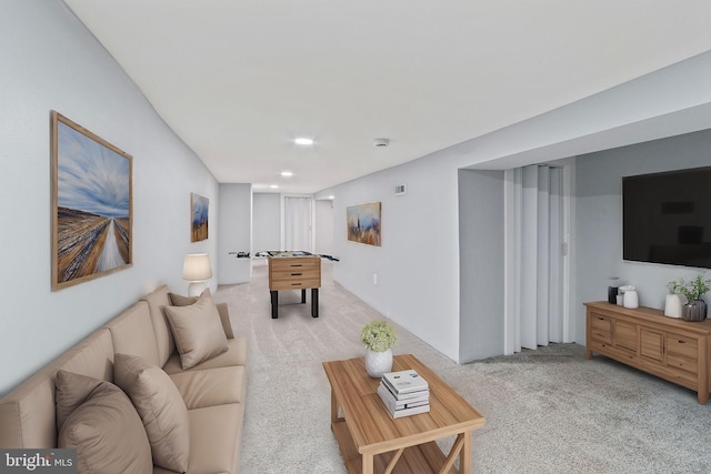 carpeted living room with recessed lighting