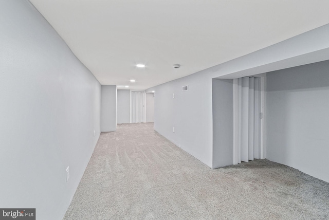 finished basement with carpet flooring and recessed lighting