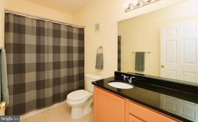 full bath featuring visible vents, curtained shower, tile patterned floors, vanity, and toilet