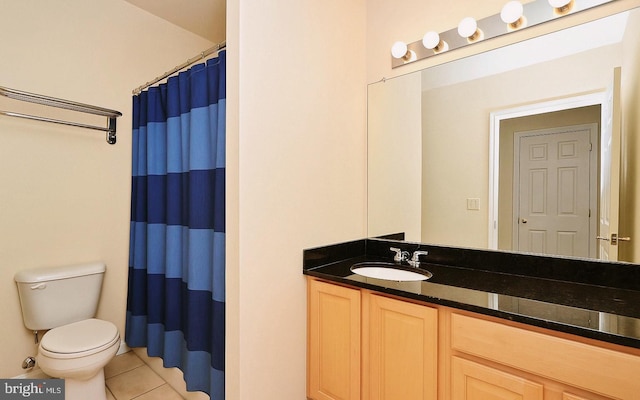 bathroom with tile patterned floors, vanity, toilet, and a shower with shower curtain