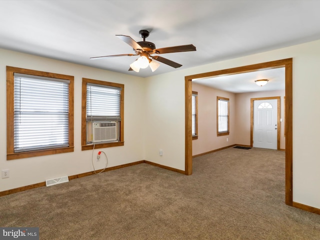 819 Manns Ter, Cumberland, MD 21502 - carpeted spare room featuring a ceiling fan, baseboards, visible vents, and cooling unit