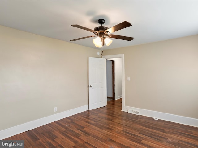 819 Manns Ter, Cumberland, MD 21502 - spare room featuring baseboards, a ceiling fan, dark wood-type flooring, and visible vents