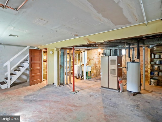 819 Manns Ter, Cumberland, MD 21502 - unfinished basement with stairway and gas water heater