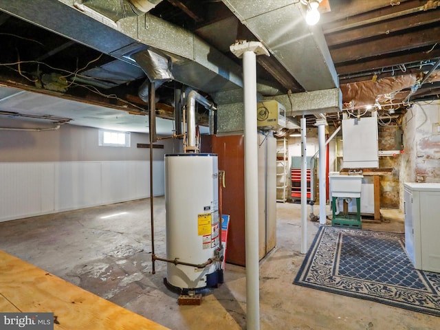 819 Manns Ter, Cumberland, MD 21502 - below grade area with a sink, wainscoting, and water heater