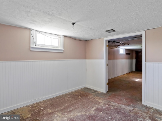 819 Manns Ter, Cumberland, MD 21502 - basement with a textured ceiling and wainscoting