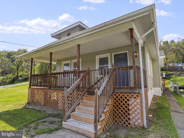 819 Manns Ter, Cumberland, MD 21502 - view of front of property featuring covered porch and a front lawn