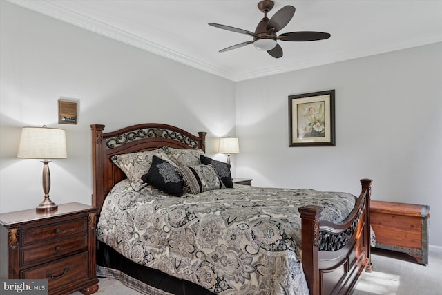 bedroom featuring crown molding, ceiling fan, and light carpet