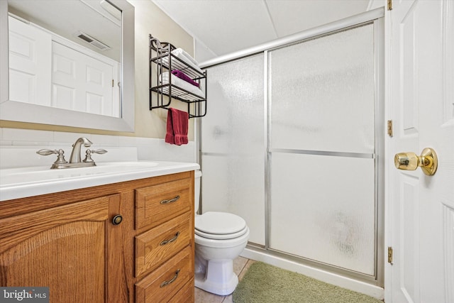full bath featuring visible vents, tile patterned flooring, vanity, toilet, and a shower stall