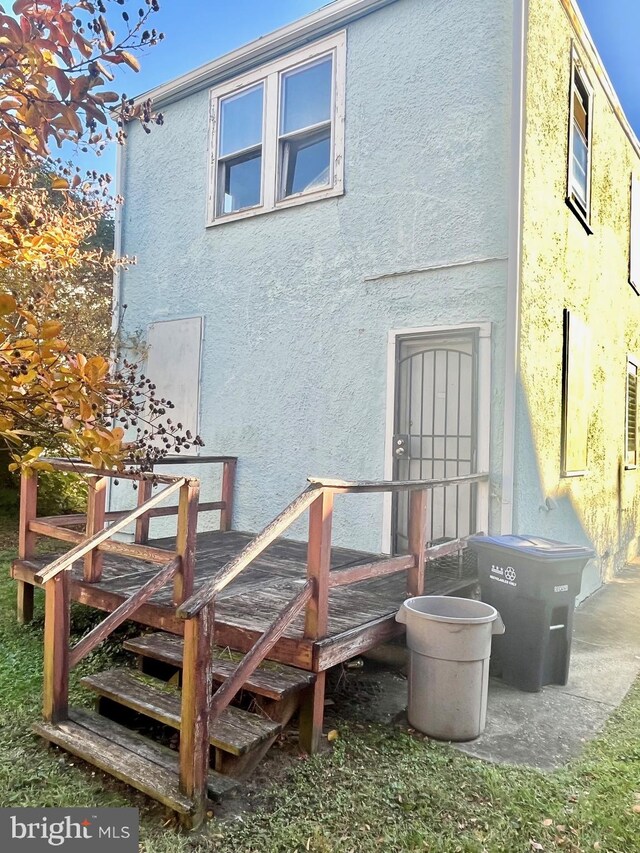 4304 Jay St NE, Washington, DC 20019 - rear view of property with stucco siding