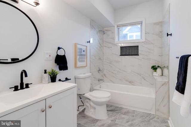 full bath featuring vanity, marble finish floor, shower / bathing tub combination, and toilet
