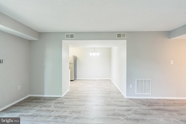 7743 Inversham Dr Unit 197, Falls Church, VA 22042 - spare room featuring wood finished floors and a chandelier