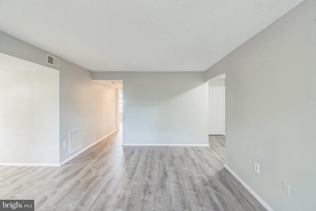 7743 Inversham Dr Unit 197, Falls Church, VA 22042 - spare room with light wood-style floors and a textured ceiling
