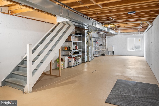 2738 Tilton St, Philadelphia, PA 19134 - unfinished basement with a sink, heating unit, and stairway