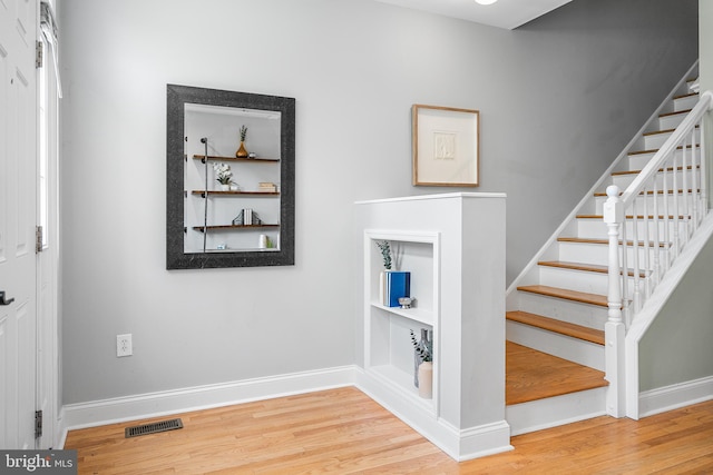 2738 Tilton St, Philadelphia, PA 19134 - staircase featuring visible vents, baseboards, and wood finished floors