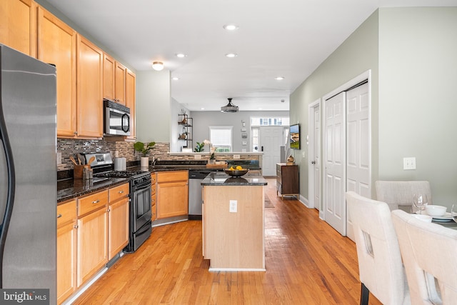 2738 Tilton St, Philadelphia, PA 19134 - kitchen featuring recessed lighting, open floor plan, appliances with stainless steel finishes, and light wood-style flooring