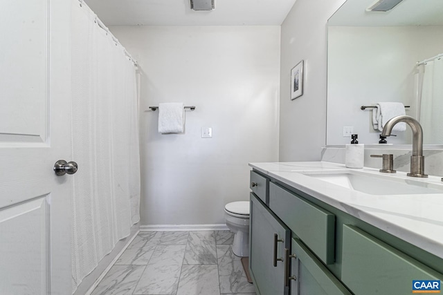 full bath featuring baseboards, marble finish floor, vanity, and toilet