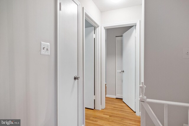 hall with light wood-type flooring