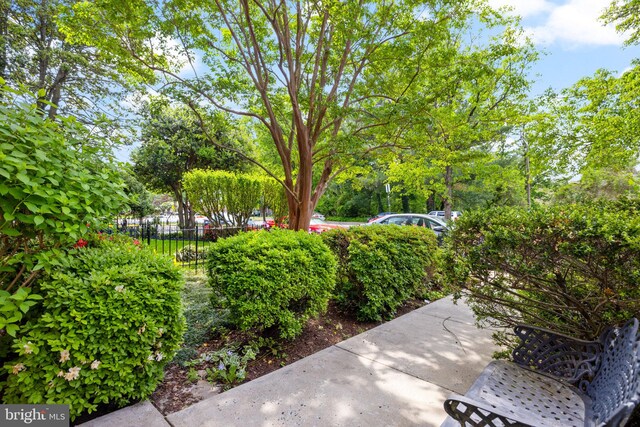 view of patio featuring fence