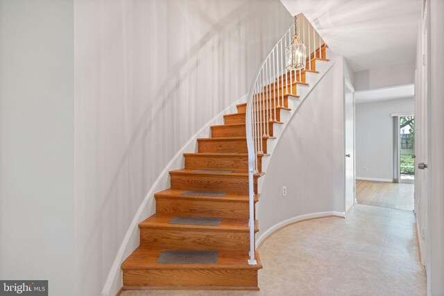 staircase with baseboards