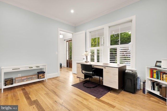 home office with crown molding, recessed lighting, light wood-style flooring, and baseboards