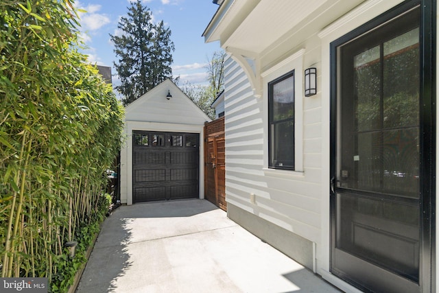 garage with driveway