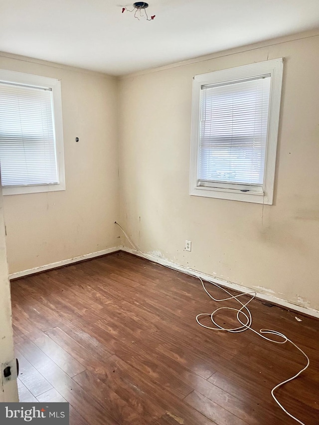 2407 Matthew Henson, Landover, MD 20785 - spare room with wood-type flooring and baseboards