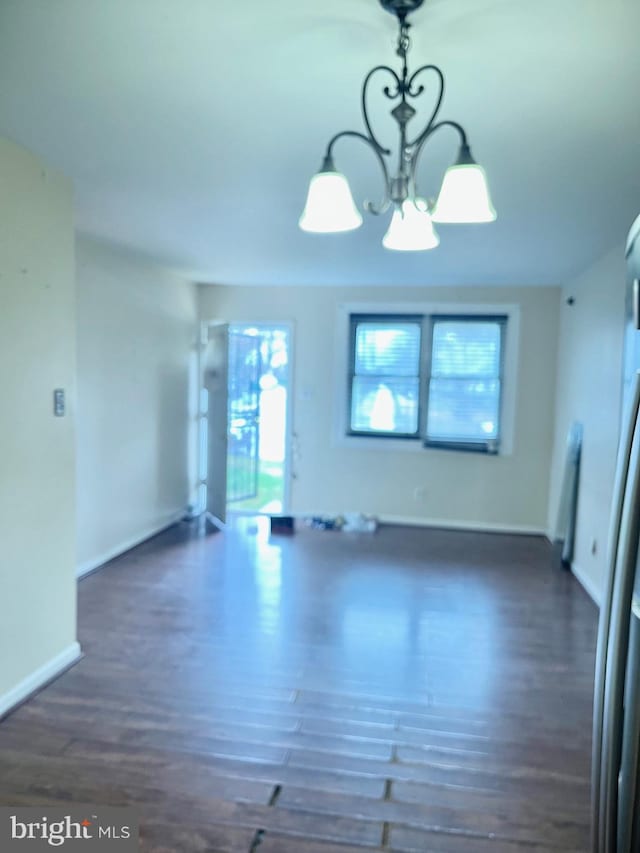 2407 Matthew Henson, Landover, MD 20785 - interior space with a chandelier, wood finished floors, and baseboards