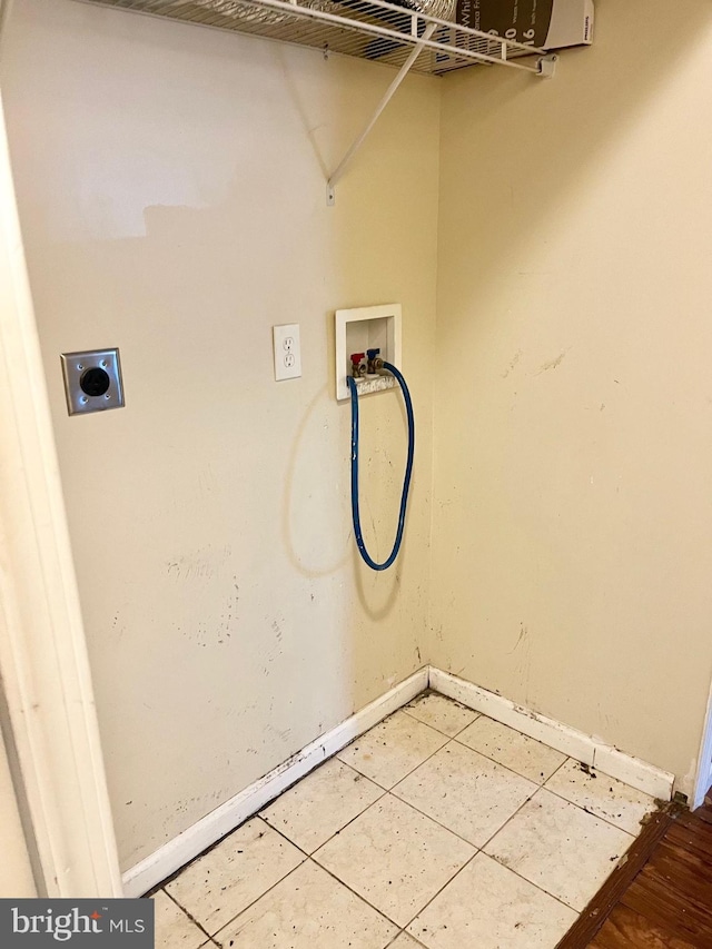 2407 Matthew Henson, Landover, MD 20785 - laundry room featuring laundry area, washer hookup, baseboards, and hookup for an electric dryer